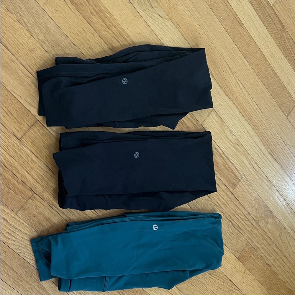lululemon lot of three leggings: size 2 two pair Black and one green teal